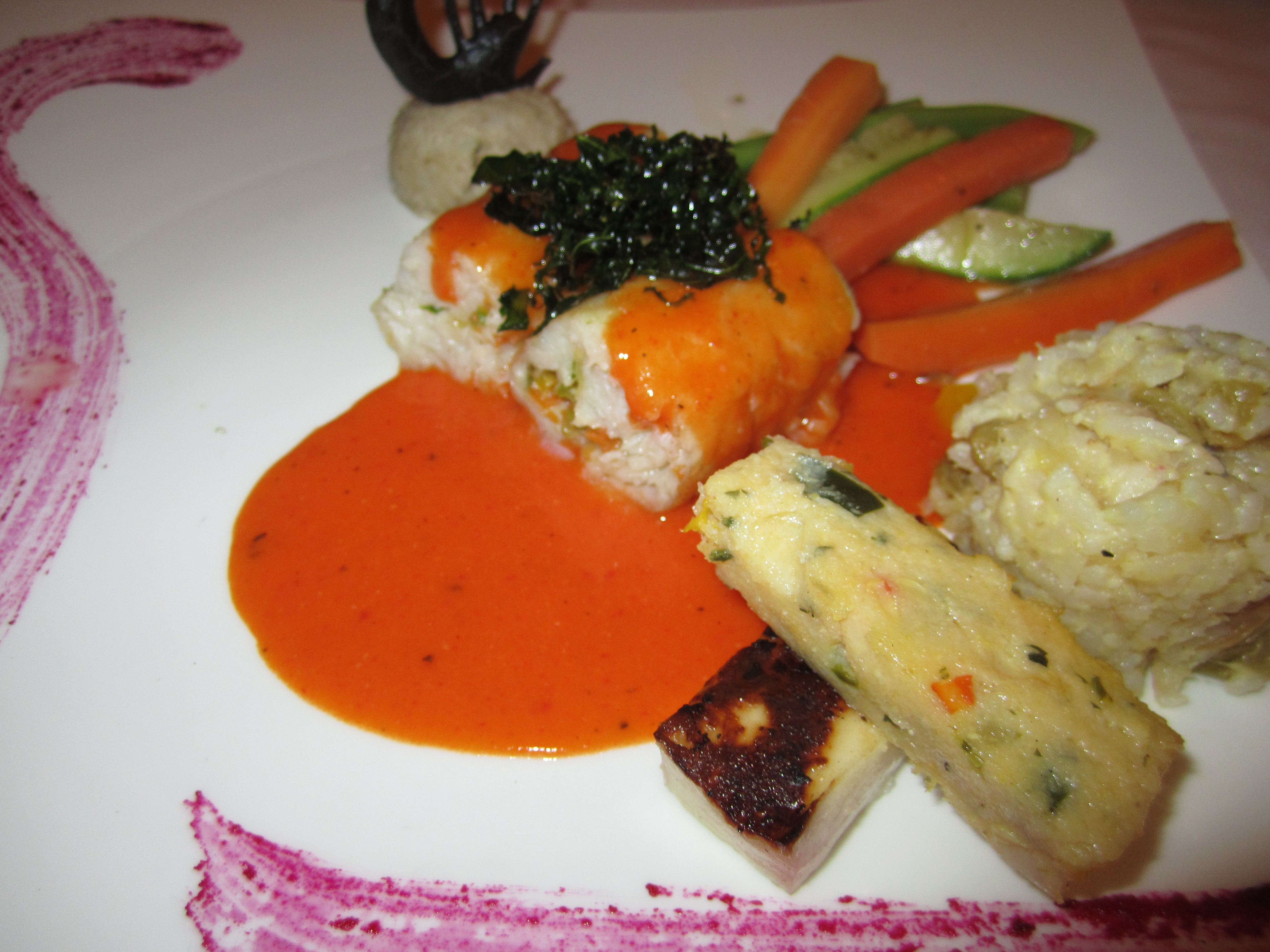 The Royal Cancun Restaurants: Maria-Marie - Monkfish Wrap around vegetables and topped with crispy fried spinach